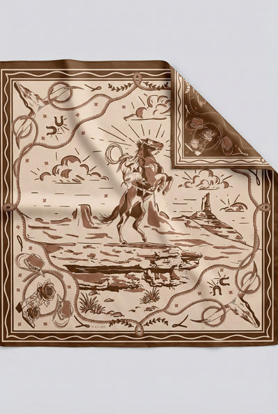 Imagem da estampa do lenço amazona em twill de seda com ilustração de um cavaleiro em um cavalo, cercada por elementos amazonenes.