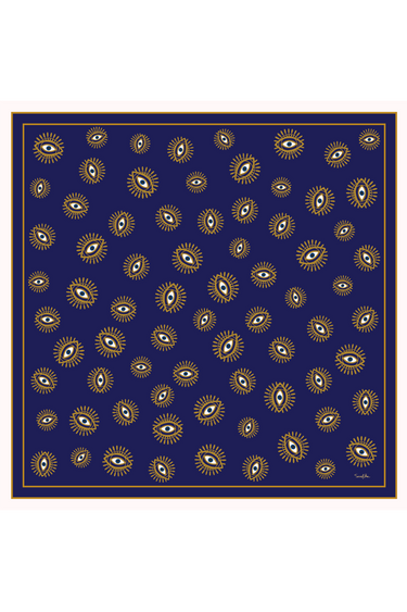 Imagem da estampa do Lenço Olho Grego Azul, com padrão de olhos gregos em detalhes dourados sobre fundo azul escuro, criando um visual sofisticado e misterioso.