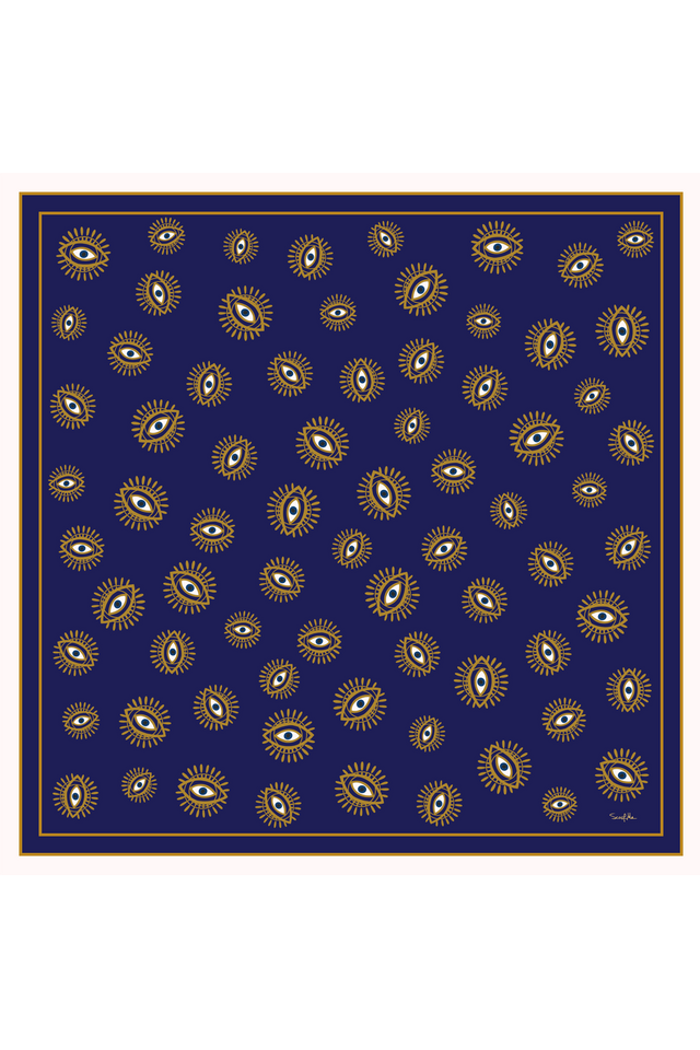 Imagem da estampa do Lenço Olho Grego Azul, com padrão de olhos gregos em detalhes dourados sobre fundo azul escuro, criando um visual sofisticado e misterioso.